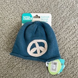 Blue and white knit newborn peace hat
